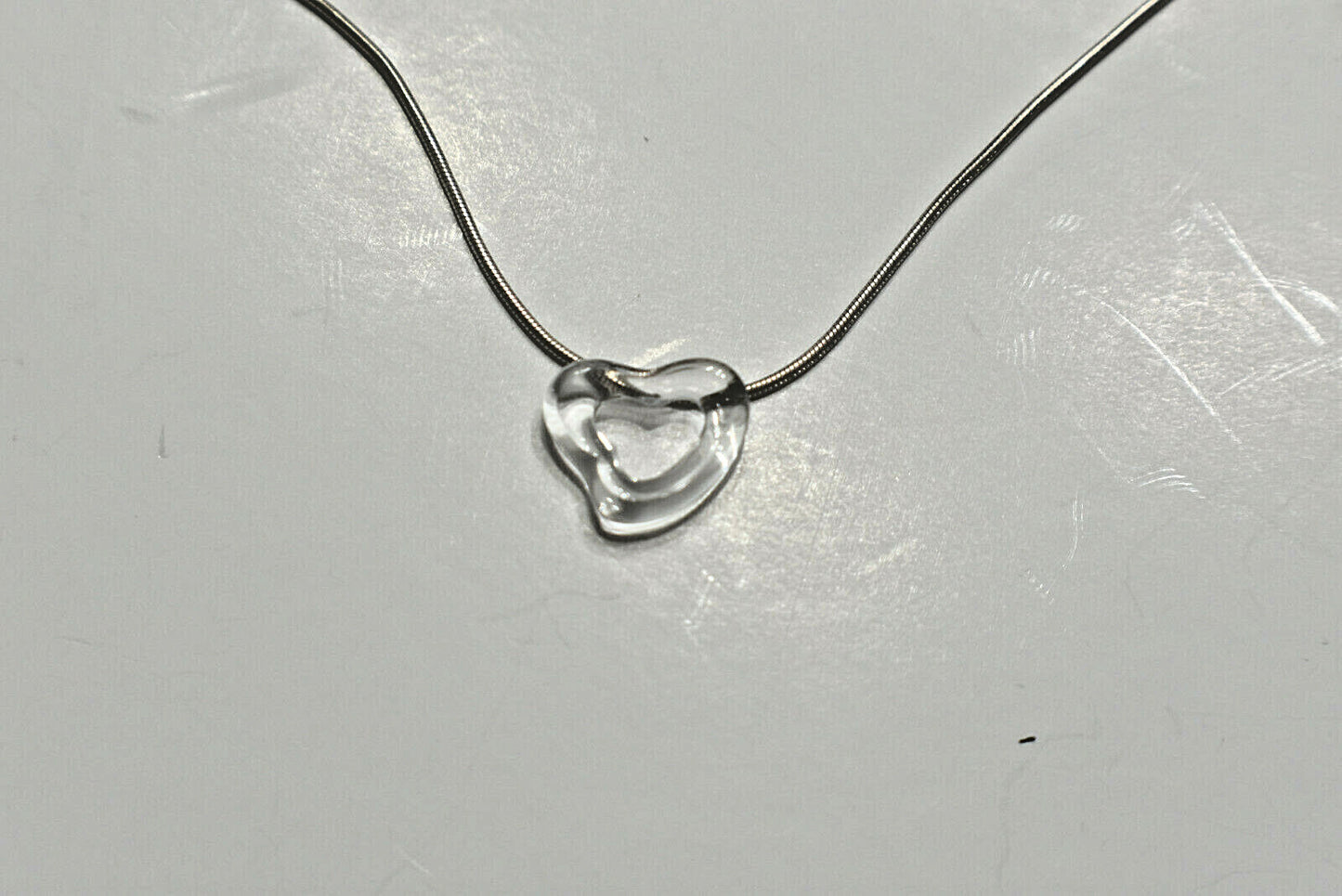 Tiffany & Co Rock Crystal Hand Carved Open Heart SS Peretti Pendant Necklace