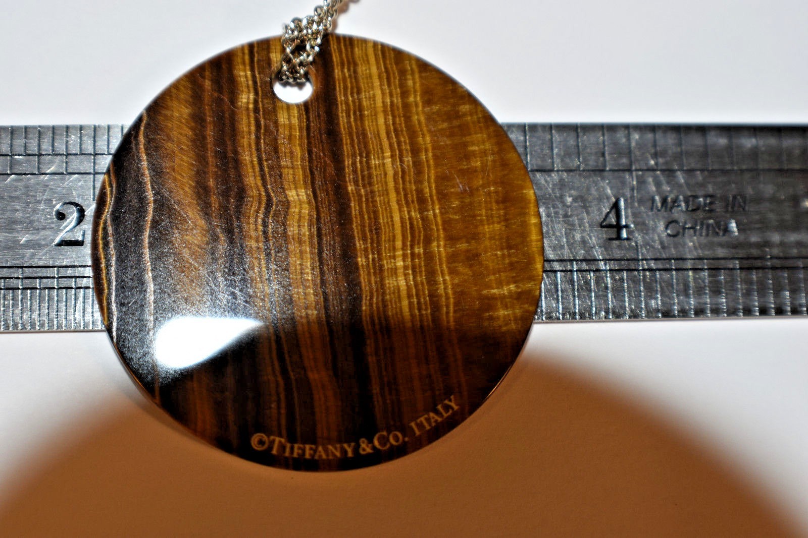 Tiffany & Co Tigers Eye Fifth Ave. Notes Large Round Pendant Necklace 17" w/ Box