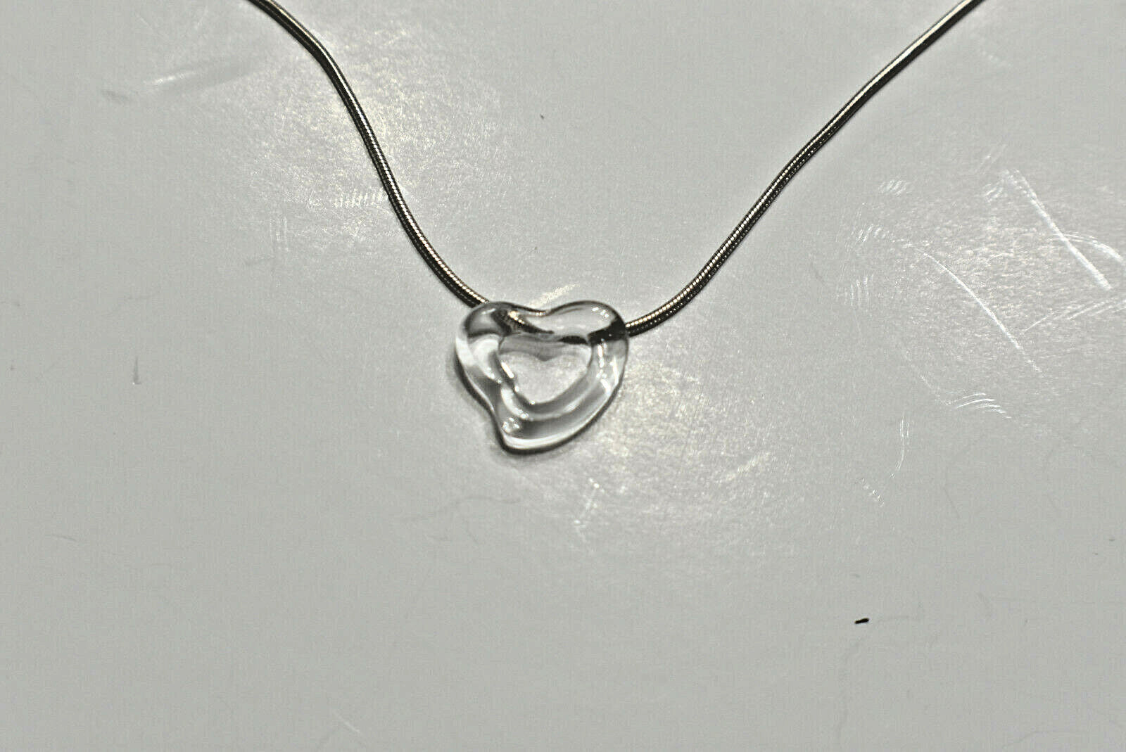 Tiffany & Co Rock Crystal Hand Carved Open Heart SS Peretti Pendant Necklace