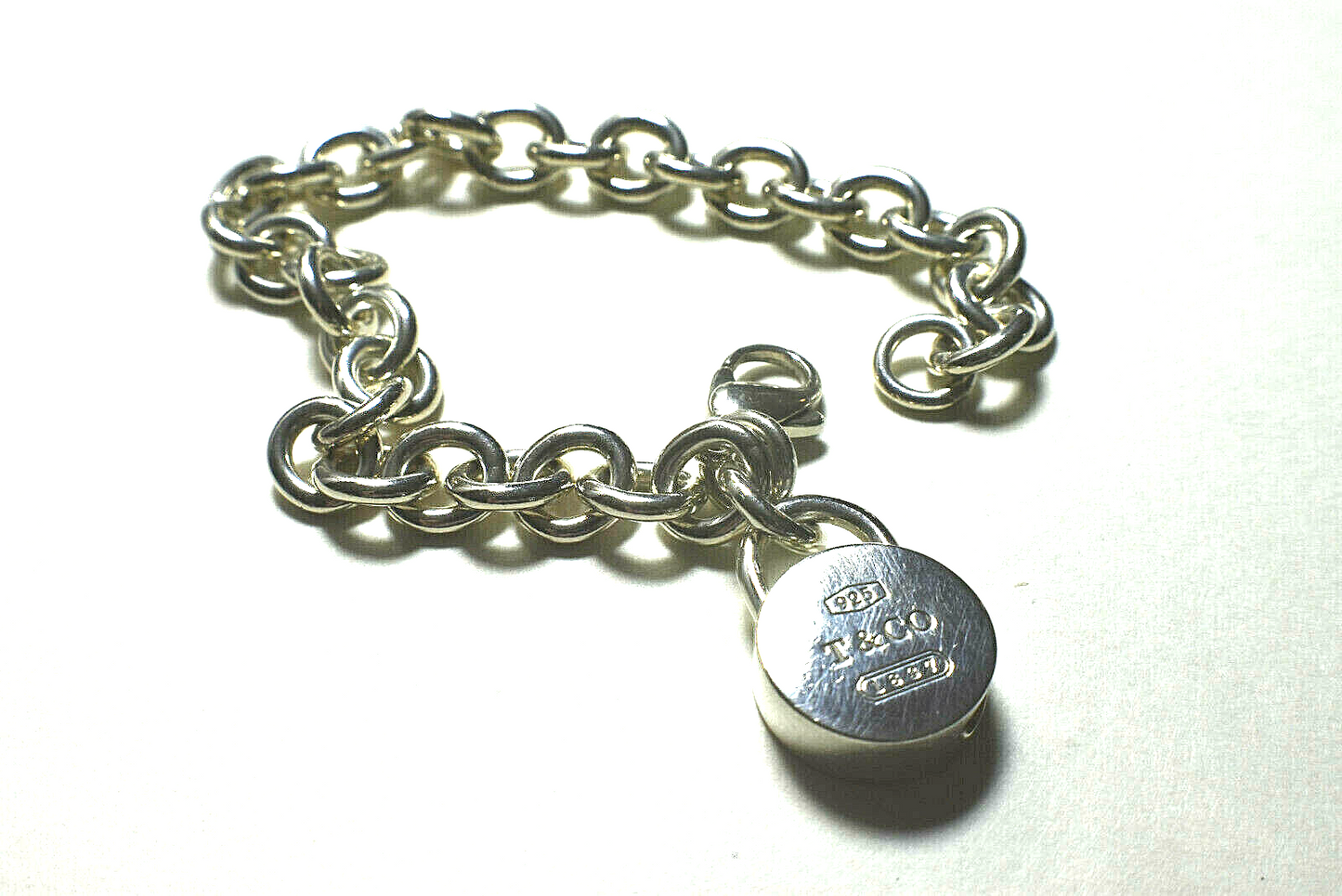 Tiffany & Co 1837 Round Lock Charm Pendant (Opens) Link Bracelet Sterling Silver